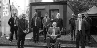 From left to right: Captain John Clifton, The Reverend Anthony Ball, Emmanuel Gotora, Stephen Serrant, Andy Hill, Lieutenant Colonel Drew McCombe, Tom Hill, Eddie Hughes MP, The Reverend Dr James Hawkey