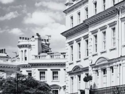 A black and white image of a series of properties in central London.