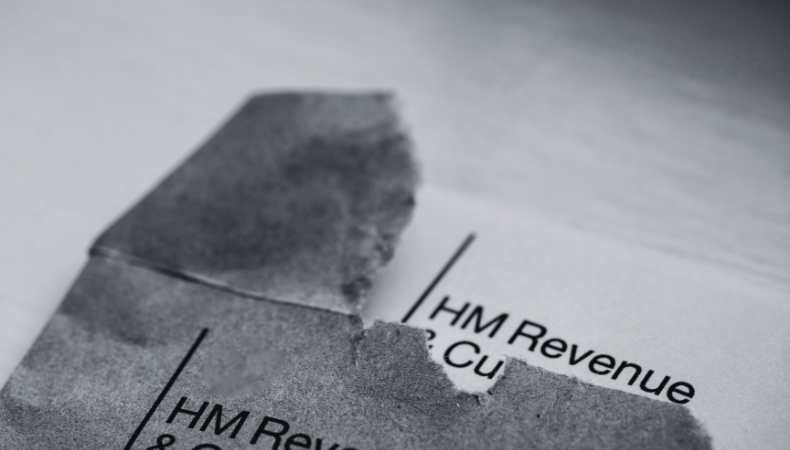 The image show cases a letter that's been opened from HMRC.