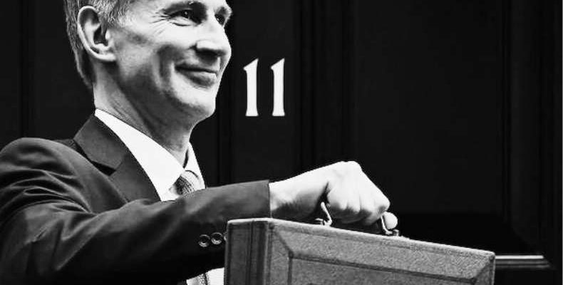 Jeremy Hunt holding the budget briefcase outside 11 Downing Street.