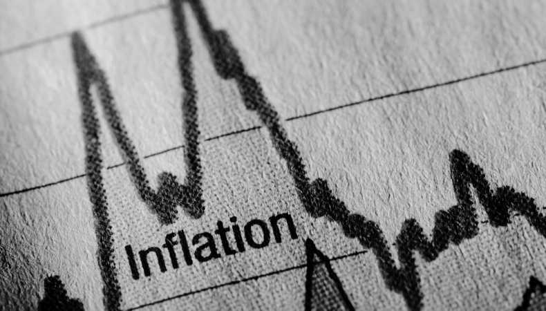 A black and white image of a graph that shows the rise and fall of inflation