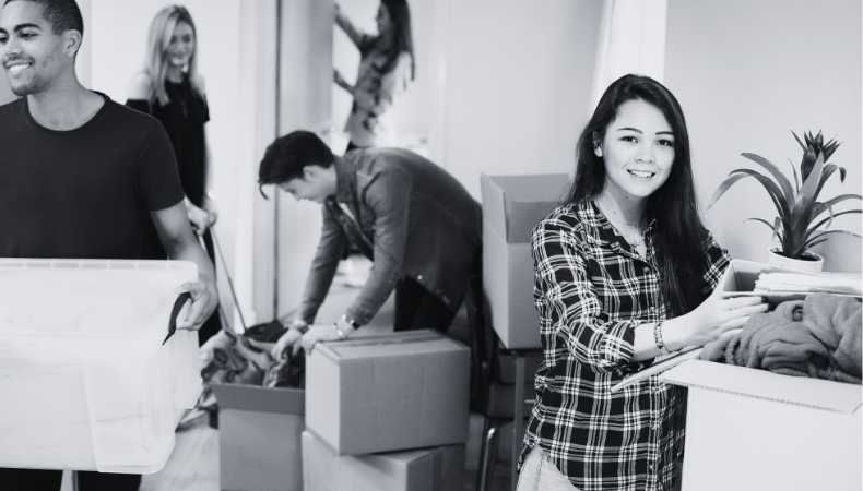 A group of students unpacking in student accommodation