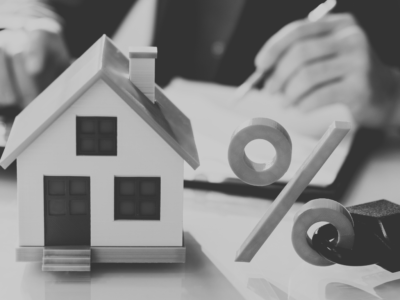 Black and white image with house and percentage symbol with a lock