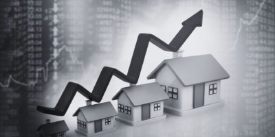 Data chart growth with houses in black and white