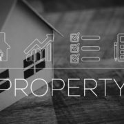 Black and white image of graphic with house and the word property