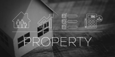 Black and white image of graphic with house and the word property