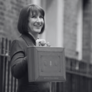 Black and white image of Rachel Reeves outside 10 downlinng street for the 2025 spring statement review