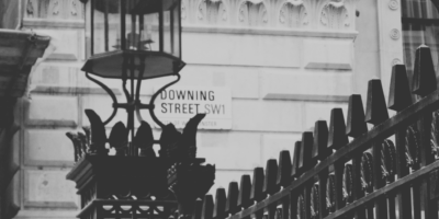 Black and white picture of Downign Street sign