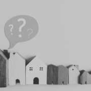 Line of houses with question mark
