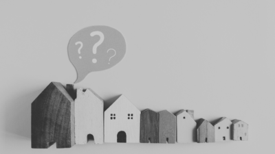Line of houses with question mark