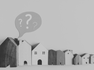 Line of houses with question mark