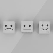 Wooden blocks of emotive faces