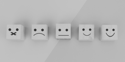 Wooden blocks of emotive faces