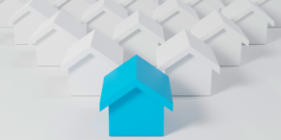 Row of digital houses with blue house leading