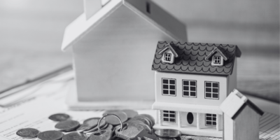 Black and White House with money