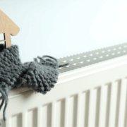 Radiator with wooden house and scarf