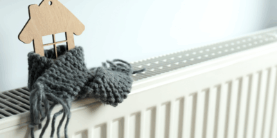 Radiator with wooden house and scarf