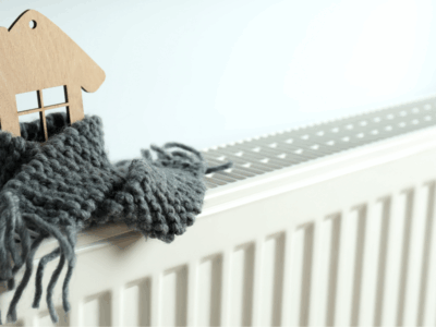 Radiator with wooden house and scarf