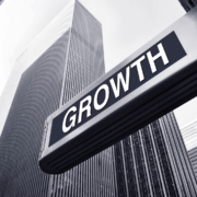 Growth sign with high rise building