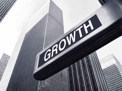 Growth sign with high rise building