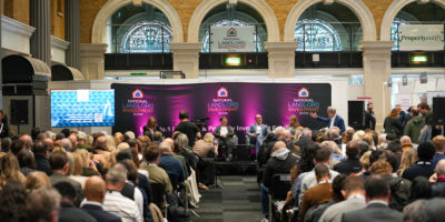 Panel and group of people