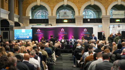 Panel and group of people