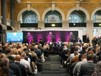 Panel and group of people