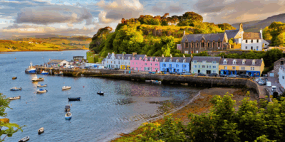 Picture of coastline in scotland with a rainbow line of houses