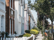 UK residential street and row of houses with street