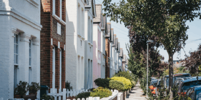 UK residential street and row of houses with street