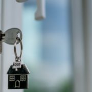 Key in the door with a house keyring